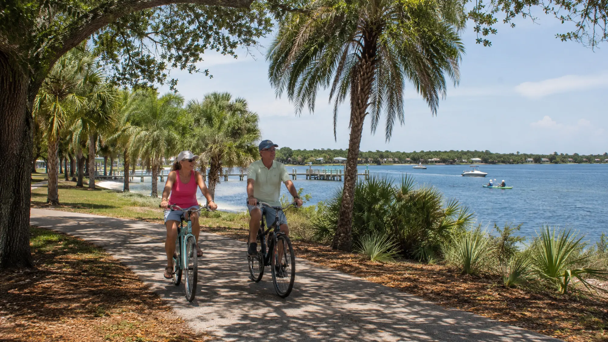 Visitors enjoying shallow coastal water near Englewood